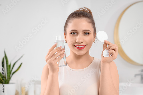 Beautiful young woman with ...