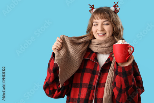 Pretty young woman in scarf...