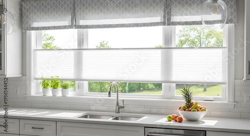 Bright kitchen window with blinds letting in natural light over a sink with fresh flowers and fruit.