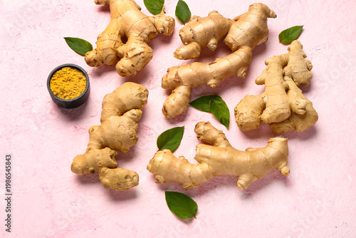 Fresh ginger roots with lea...