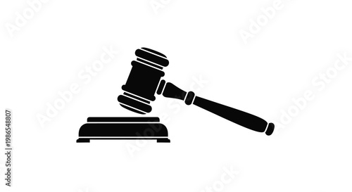 A black silhouette of a gavel resting on a sound block