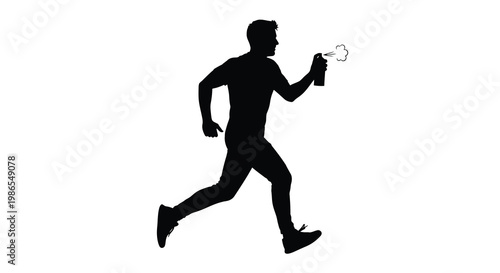 Silhouette of a man running and spraying something from a can