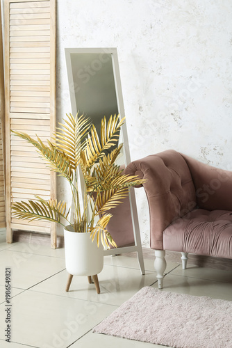 Cozy pink armchair, mirror ...