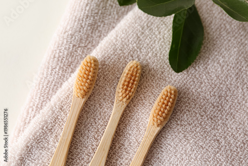 Bamboo tooth brushes on tow...