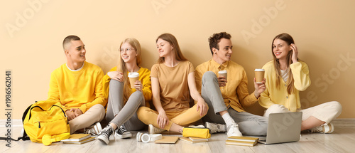 Group of students sitting o...