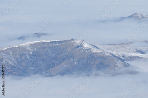 The snow-capped Japanese Alps as seen from Mount Yatsugatake
