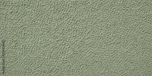 A vintage grey fabric texture with a rough grunge surface and dirty material pattern serves as a unique backdrop for this blank stone and plaster wall design