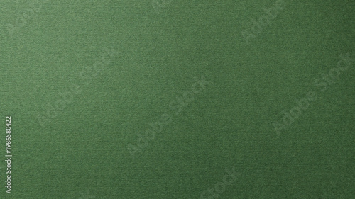 Dark green textured paper background with natural fiber pattern for design projects
