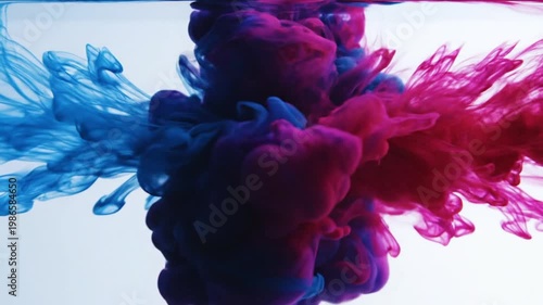 Abstract ink in water background, vibrant blue and pink liquid swirls, colorful acrylic paint mixing in slow motion, artistic fluid motion texture