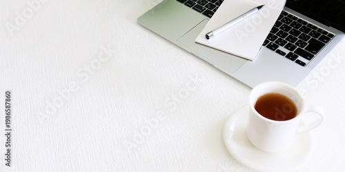 Fotografija Minimal workspace with laptop and coffee, large copy space background