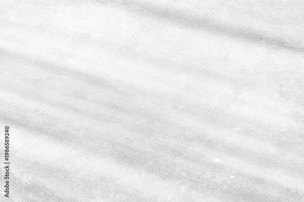 Obraz premium Minimalist white concrete texture background with subtle diagonal shadows, creating a soft, modern look