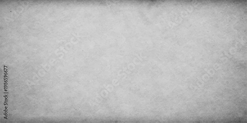 A textured dark gray grunge concrete wall background with a rough aged surface provides a blank vintage material backdrop for design copy space