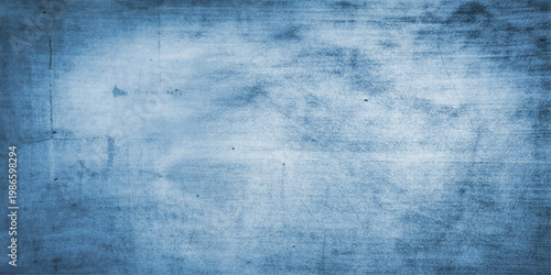 Blue grunge textured background with vintage aged rough surface and dirty artistic pattern design