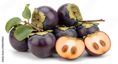 Fresh Plums with Green Leaves Isolated.