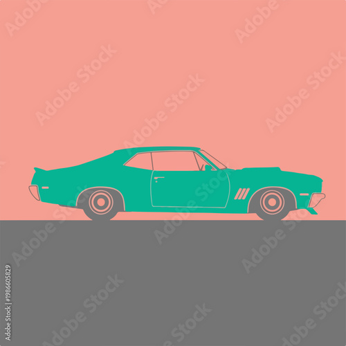 A green vintage car on a gray road