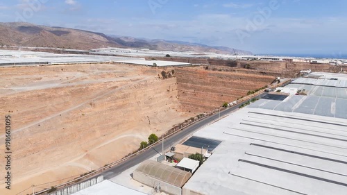 mine earth mining dig industry nature control greenhouse invernaderos plastic sea intensive farming drone texture terra forming - Andalusia, Spain - 2025