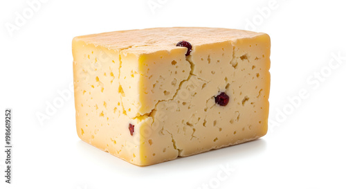 Cracked block of cheddar cheese.