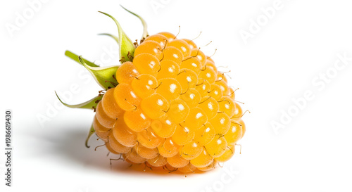 Fresh yellow raspberry on white background.