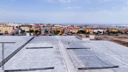 plastic sea town roof industry agriculture intensive farming texture landscape drone city urban building - Andalusia, Spain - 2025