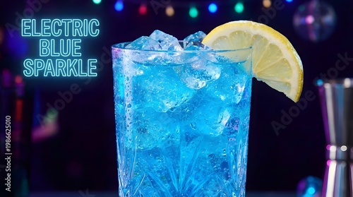 Electric Blue Sparkling Citrus Drink with Ice Cubes and Lemon Wedge