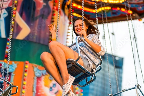 Fotografie Joyful ride at amusement park