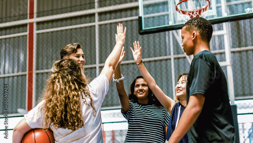 Canvas Print Youthful basketball team celebration photo