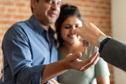 Photography Couple receiving new home keys