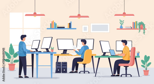 People working in a modern office environment with computers.