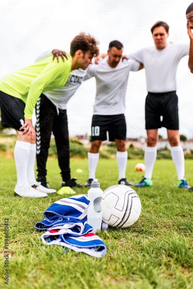 Obraz premium Soccer team huddle preparation photo