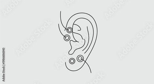 Detailed line art diagram showing specific acupuncture and pressure points on a human ear for traditional medical treatment and therapy purposes.