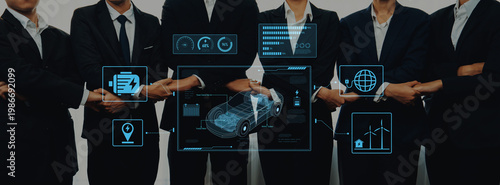 Photos A professional business team stands confidently in suits, showcasing digital interface elements that represent technology and data analysis for future growth
