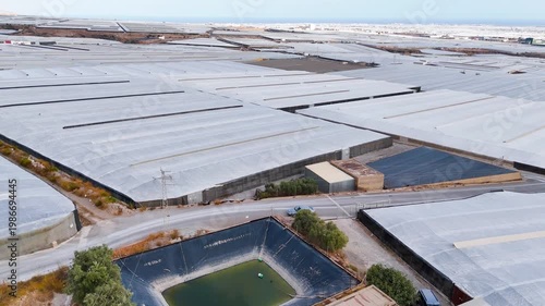 greenhouse field plastic sea texture industry invernaderos drone travel business capitalism intensive farming mass production industrial roof architecture - Andalusia, Spain - 2025