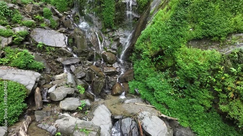 Small Clear River Stream Flowing Through Rugged Rocky Terrain