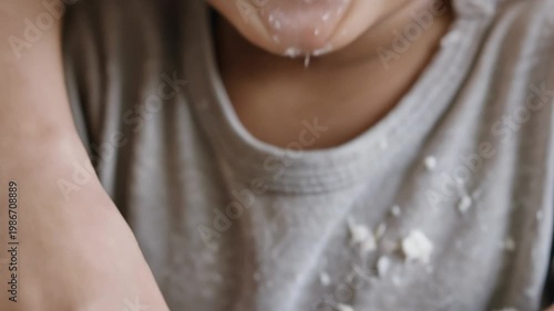 Messy Toddler Enjoying a Sweet Treat