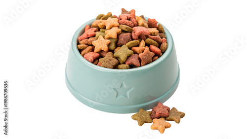 Bowl filled with colorful star-shaped pet food near scattered pieces  isolated on transparent background cut out
