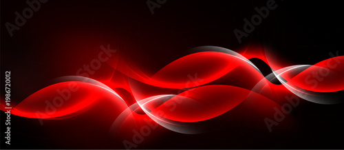 Abstract red waves over black background. Dynamic lines create glowing effect, modern design element. Smooth curves suggest movement.