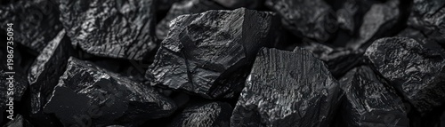 Artistic close-up shot of coal chunks, highlighting their rugged texture and natural form, symbolizing the raw materials that fuel global industries