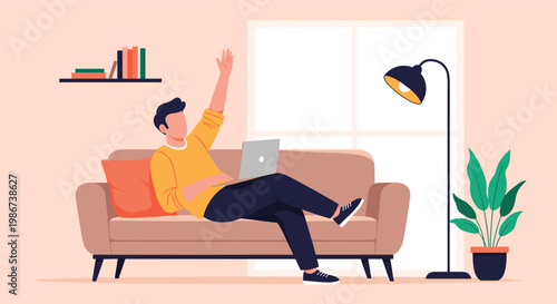 Man relaxes on a comfortable sofa while working on his laptop and raising one hand as if in a video call at home.