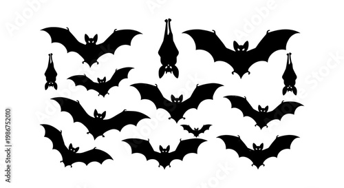 Halloween bat silhouettes collection, set of 12 black flying and hanging bat icons, spooky nocturnal animal vector elements for gothic party decor