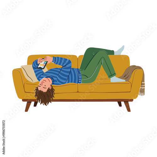 A man reclines on a couch indoors relaxing and reading a book leisurely.