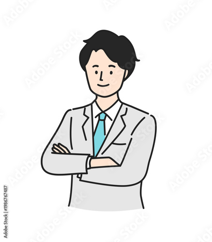 腕組みをするスーツの若い男性