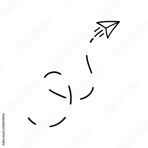 A person throws paper airplane in windy outdoor setting freely