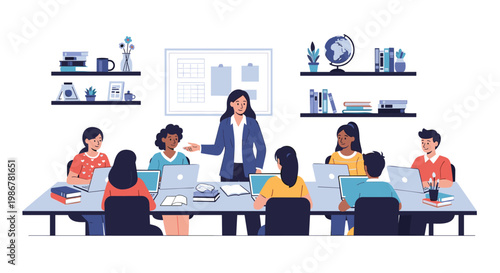 Female teacher standing and guiding a group of diverse students working on laptops at a long table in a modern classroom.