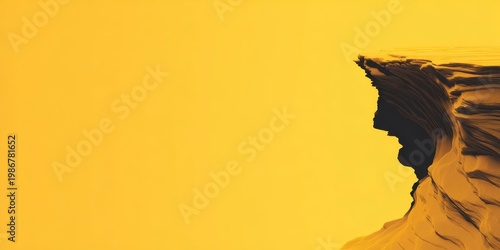 Abstract Yellow Background with Dark Silhouette of Rock Formation