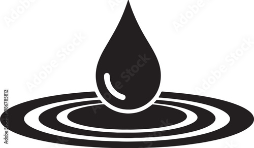 Water drop falling creating ripples on liquid surface.