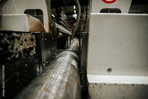 Fotografie Industrial pipe bending machine close-up in metal fabrication factory