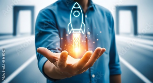 Man holding glowing rocket icon in hand for business concept