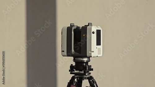 Geodetic 3D scanner performs a close-up scan of the room. High quality 4k footage