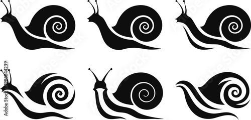 Set of black snail silhouettes on white background