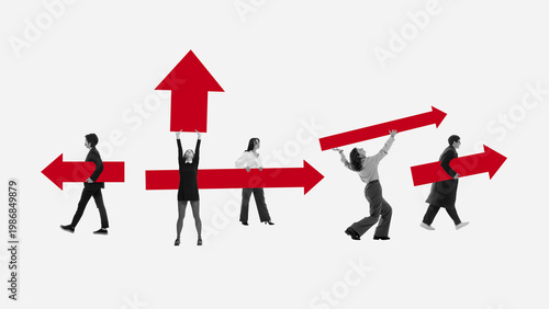 Fotografie People holding red arrows showing different directions decision making